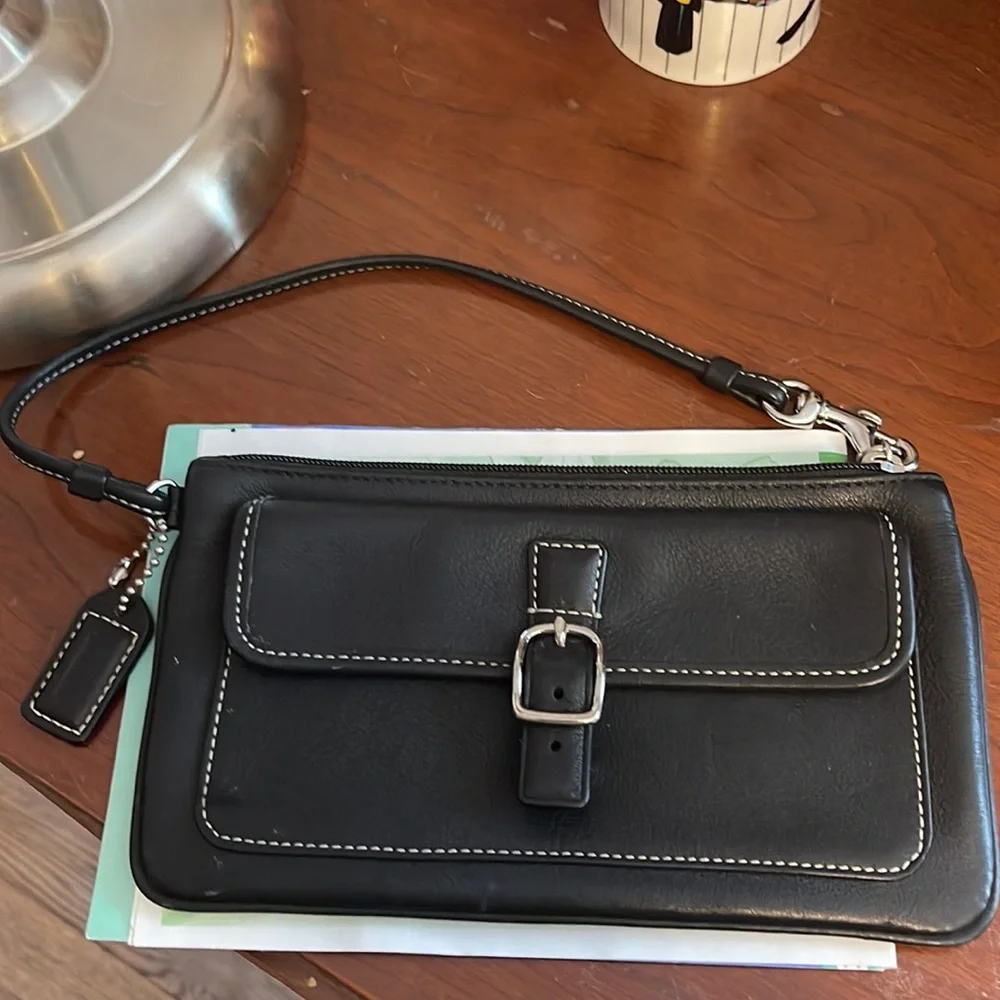 Coach wristlet, black with zipper on top.  7 1/2 by 4 1/2 “. Very clean. - Picture 2 of 4